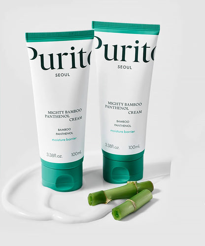 Two tubes of Purito Mighty Bamboo Panthenol Cream on a white background with bamboo pieces.