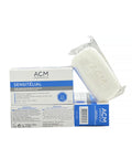 A comprehensive grouping of ACM SENSITÉLIAL products, including stacked boxes and an individually clear-wrapped soap bar, displaying all packaging components
