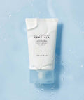 Skincare tube labeled 'Madagascar Centella' on a light blue background