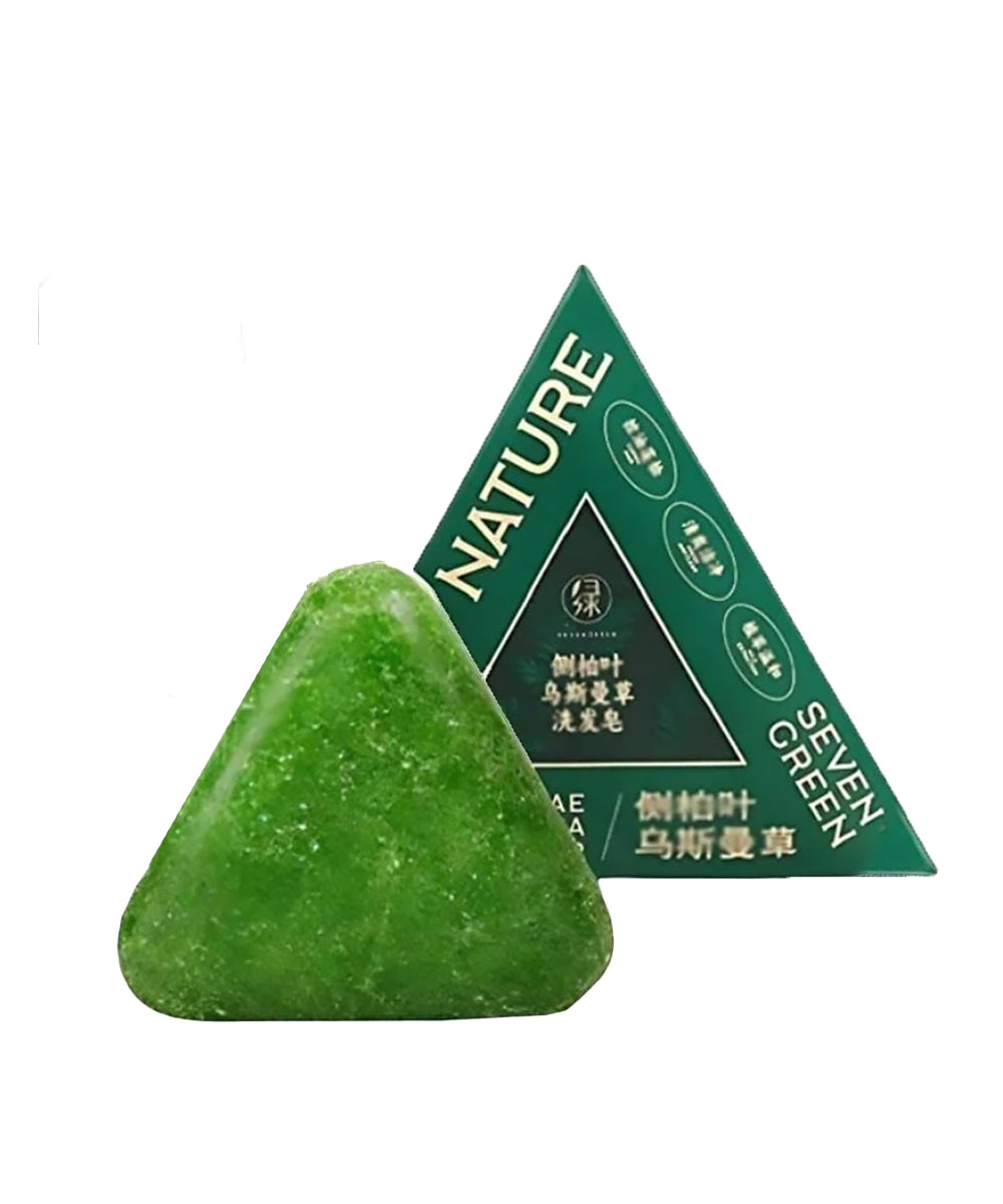 Triangular green soap bar with a green triangle-shaped packaging labeled 'Nature Seven Green' on a white background.