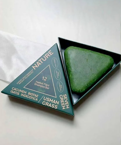 Green shampoo bar with packaging labeled 'Nature' on a white background