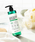Bottle of Soma by Bl body cleanser on a white tiled background