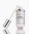 TIRTIR Ceramic Milk Ampoule bottle with dropper on a white background