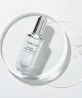 TIRTIR ceramic milk ampoule bottle on a white background