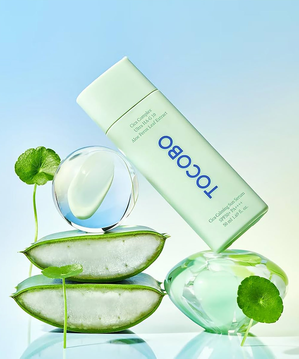 Tocobo skincare product with aloe vera slices on a gradient blue background