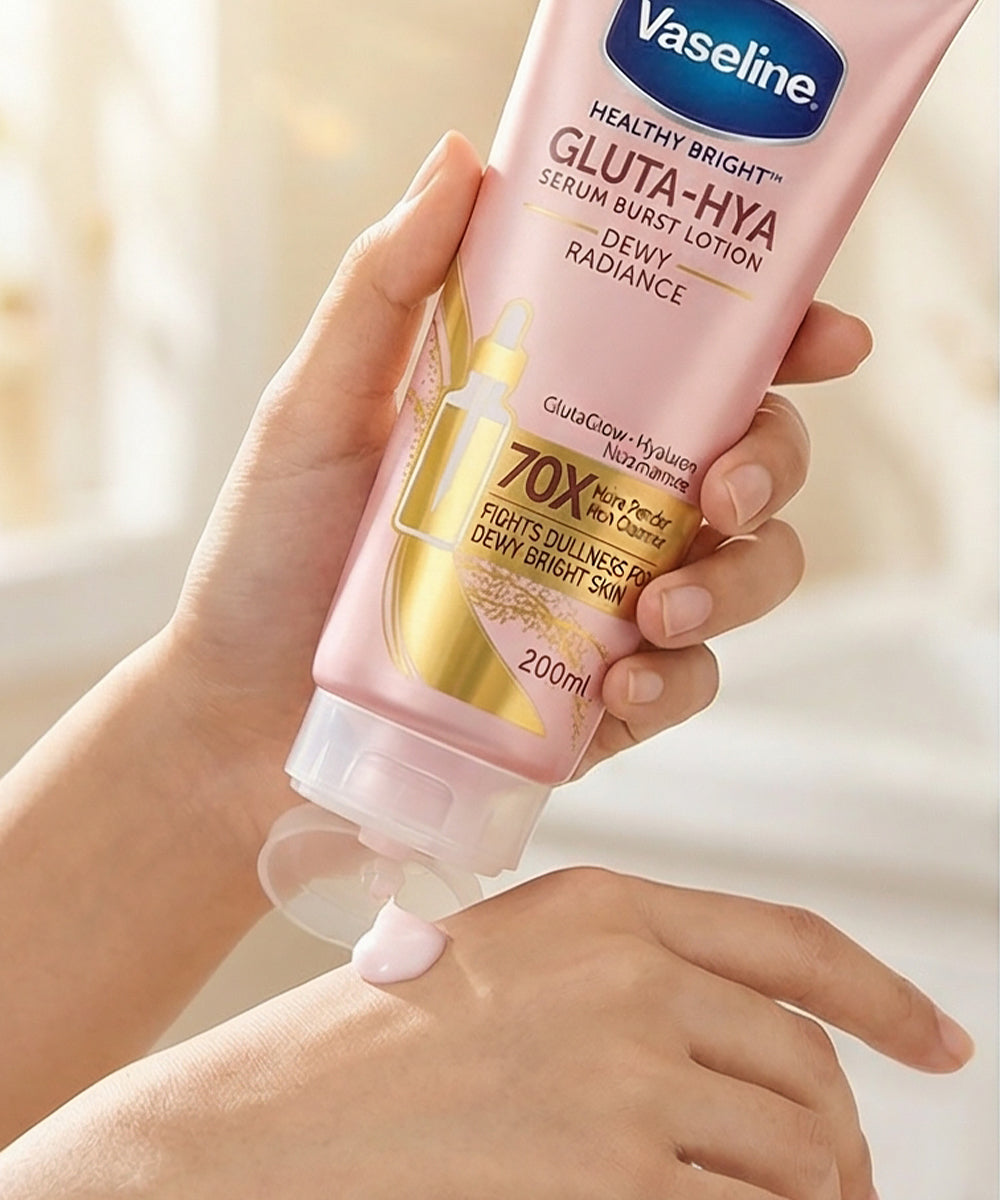 Vaseline Gluta-Hya lotion being applied to a hand with a soft background